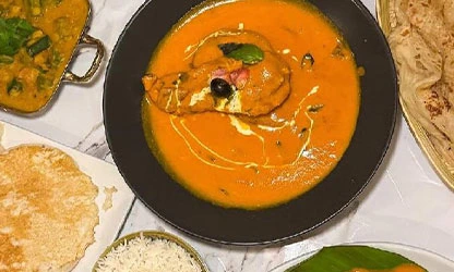 Uyare Indian curry with naan and rice, redefining Indian dining in UK