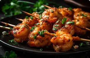 Grilled shrimp skewers served at Uyare restaurant