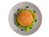 Uyare restaurant burger with fresh greens on sesame bun